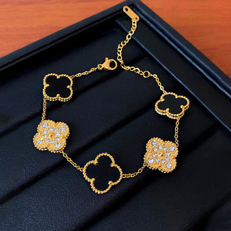 Designs & You Stainless Steel Gold-Plated Multicolor AD studded Clover Link Bracelet For Women