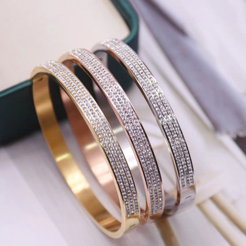 Stainless Steel Gold, Rose Gold and Silver Plated Triple Lines AD Studded Contemporary Bracelet