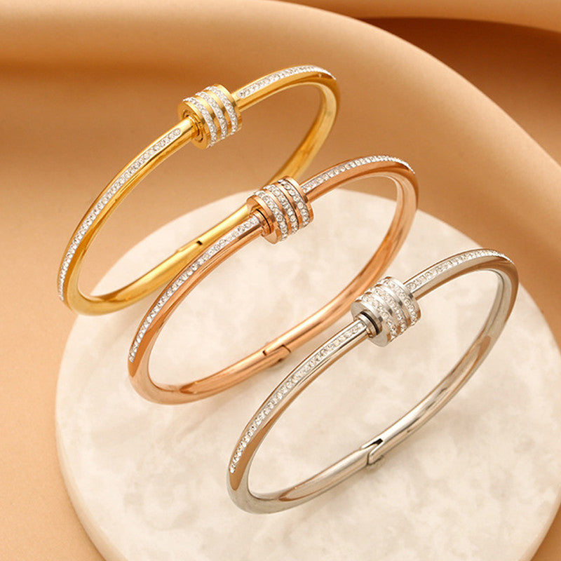 Stainless Steel Gold, Rose Gold and Silver Plated American Diamond Studded Bangle Style Bracelet