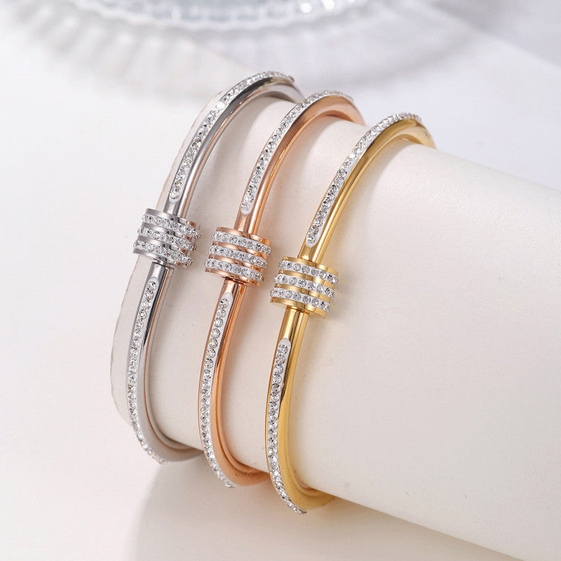 Stainless Steel Gold, Rose Gold and Silver Plated American Diamond Studded Bangle Style Bracelet