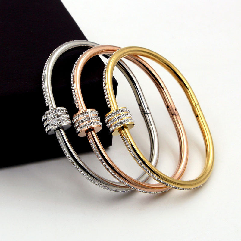 Stainless Steel Gold, Rose Gold and Silver Plated American Diamond Studded Bangle Style Bracelet