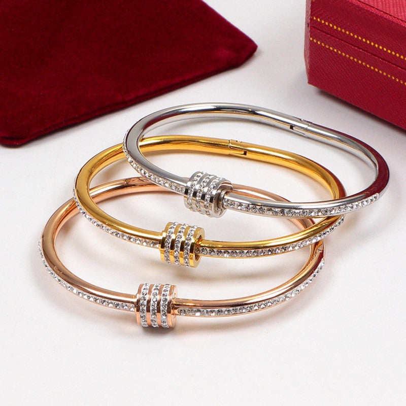 Stainless Steel Gold, Rose Gold and Silver Plated American Diamond Studded Bangle Style Bracelet