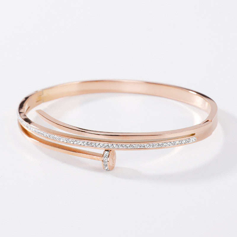 Stainless Steel Gold, Rose Gold and Silver American Diamond Studded Nail inspired Bracelet