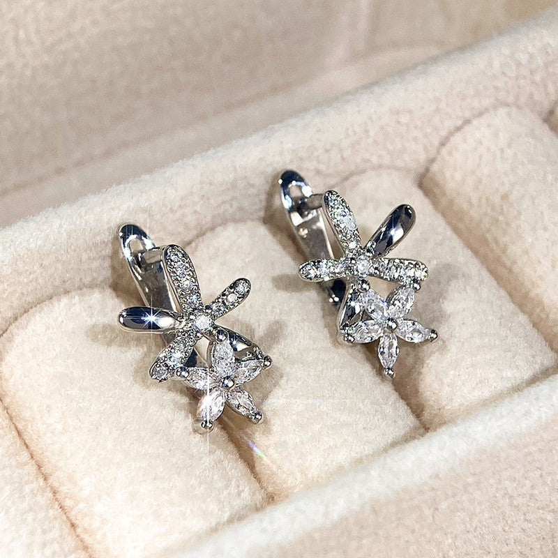 American Diamond Studded Dual Star Shaped Clip-On Earrings