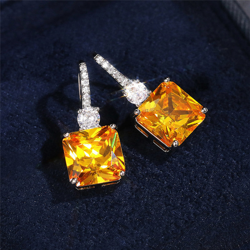 Silver Plated American Diamond Studded Yellow Square Shape Crushed Ice Cut Hanging Earrings