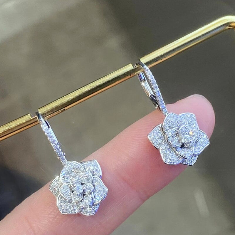 Silver Plated American Diamond Studded Floral Rose themed Drop Earrings