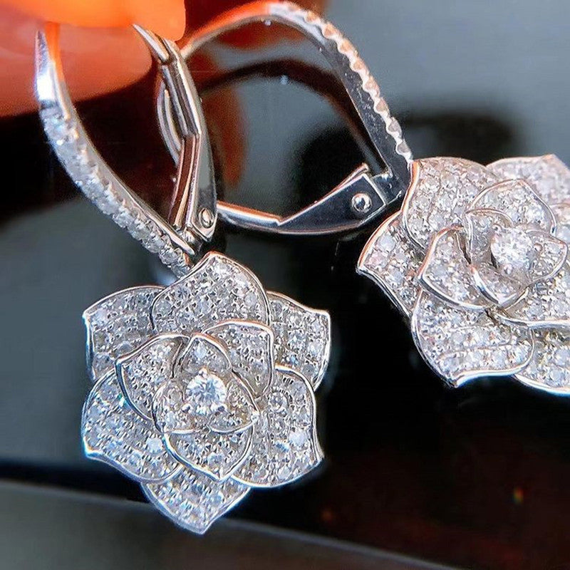 Silver Plated American Diamond Studded Floral Rose themed Drop Earrings