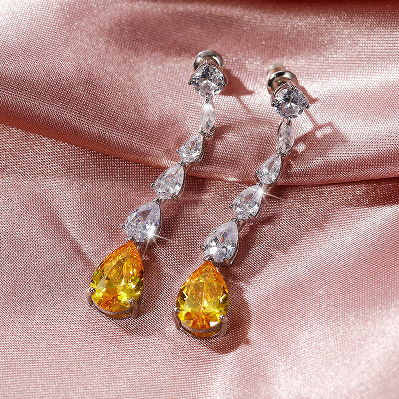 Silver Plated American Diamond Studded Yellow Teardrop Shape Crushed Ice Cut Drop Earrings