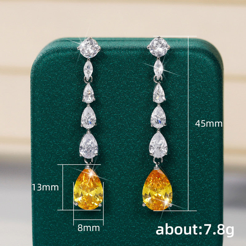 Silver Plated American Diamond Studded Yellow Teardrop Shape Crushed Ice Cut Drop Earrings