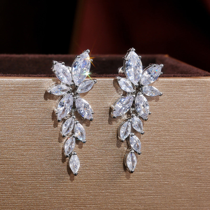 Silver Plated American Diamond Studded Floral Themed  Drop Earrings