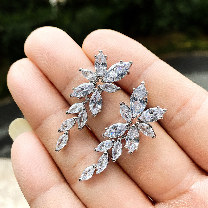 Silver Plated American Diamond Studded Floral Themed  Drop Earrings